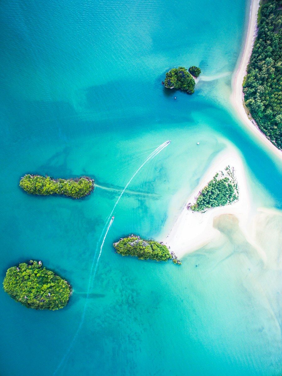 Aerial view of tropical islands with turquoise water and white sand beaches
